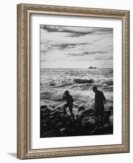Natives Swamped by Surf on Rocky Shore in Tristan Da Cunha Island-Carl Mydans-Framed Photographic Print