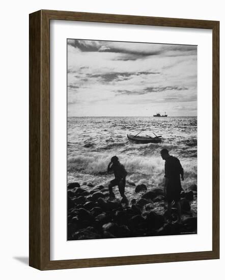 Natives Swamped by Surf on Rocky Shore in Tristan Da Cunha Island-Carl Mydans-Framed Photographic Print