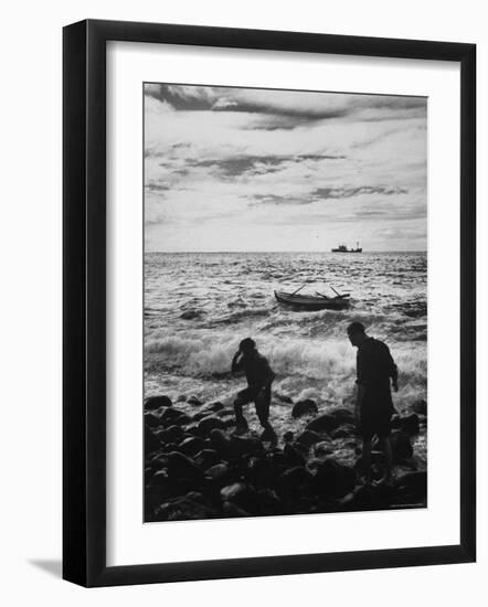 Natives Swamped by Surf on Rocky Shore in Tristan Da Cunha Island-Carl Mydans-Framed Photographic Print