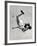 Natl. Women's Tumbling Champion, 15 Year Old, Bonnie Nebelong, in Mid Air with Legs Akimbo-Gjon Mili-Framed Photographic Print