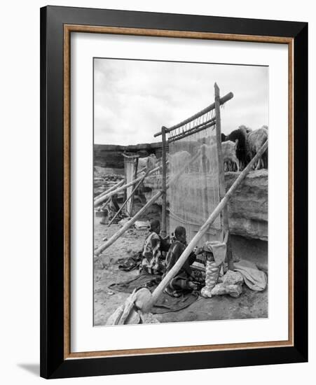 Navajo Women Weaving Blankets Photograph-Lantern Press-Framed Art Print