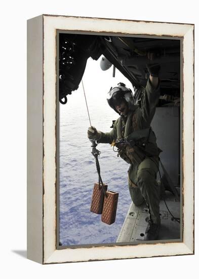 Naval Aircrewman Conducts a Search and Rescue Drill on an Mh-60S Sea Hawk-null-Framed Premier Image Canvas