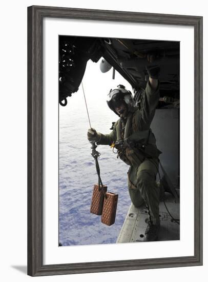 Naval Aircrewman Conducts a Search and Rescue Drill on an Mh-60S Sea Hawk-null-Framed Photographic Print