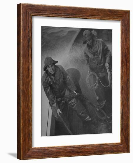 Naval Officers Working on a Ship During a Storm-George Strock-Framed Photographic Print