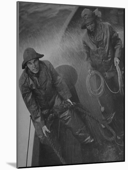 Naval Officers Working on a Ship During a Storm-George Strock-Mounted Photographic Print