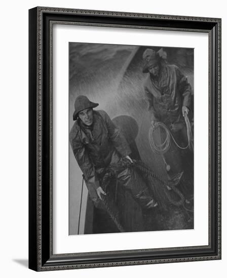 Naval Officers Working on a Ship During a Storm-George Strock-Framed Photographic Print