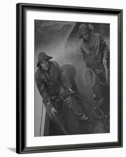 Naval Officers Working on a Ship During a Storm-George Strock-Framed Photographic Print