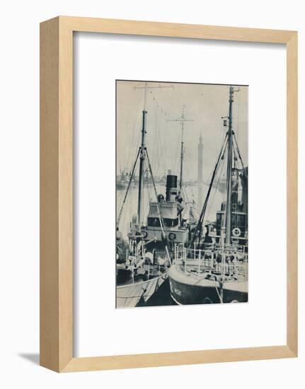 'Naval Trawler, HMS Liffy alongside a Grimsby fishing vessel in Grimsby Docks', 1937-Unknown-Framed Photographic Print