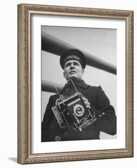 Navy Soldier Holding Camera-George Strock-Framed Photographic Print