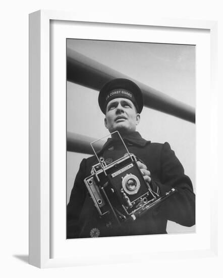 Navy Soldier Holding Camera-George Strock-Framed Photographic Print