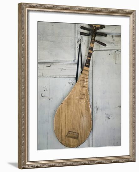 Naxi Orchestra Musical Instruments, Baisha, Lijiang, Yunnan Province, China-Walter Bibikow-Framed Photographic Print