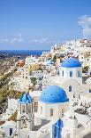 Greek Church with Three Blue Domes in the Village of Oia-Neale Clark-Photographic Print