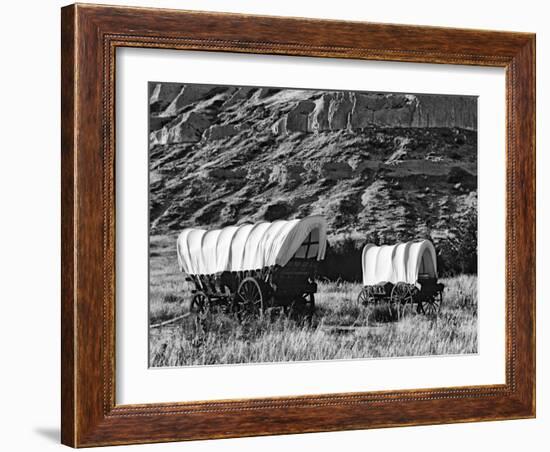 Nebraska, Scotts Bluff National Monument. Covered Wagons in Field-Dennis Flaherty-Framed Photographic Print