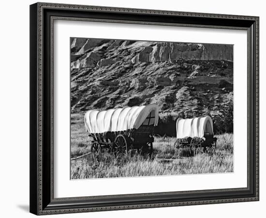 Nebraska, Scotts Bluff National Monument. Covered Wagons in Field-Dennis Flaherty-Framed Photographic Print