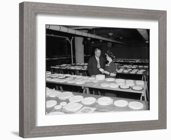 Nellie Tayloe Ross and Edward Bruce inspect designs for new Jefferson nickel, 1938-Harris & Ewing-Framed Photographic Print