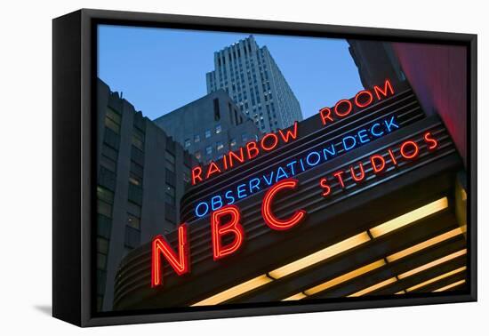 Neon lights of NBC Studios and Rainbow Room at Rockefeller Center, New York City, New York-null-Framed Premier Image Canvas