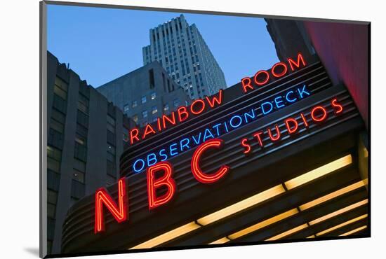 Neon lights of NBC Studios and Rainbow Room at Rockefeller Center, New York City, New York-null-Mounted Photographic Print