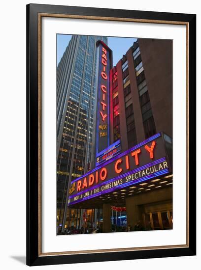 Neon lights of Radio City Music Hall at Rockefeller Center, New York City, New York-null-Framed Photographic Print