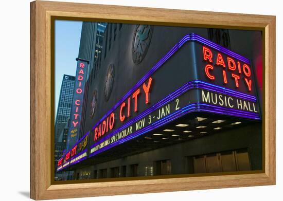 Neon lights of Radio City Music Hall at Rockefeller Center, New York City, New York-null-Framed Premier Image Canvas