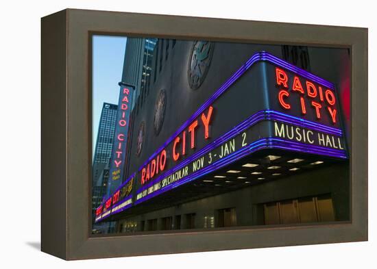 Neon lights of Radio City Music Hall at Rockefeller Center, New York City, New York-null-Framed Premier Image Canvas