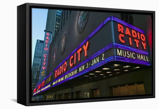 Neon lights of Radio City Music Hall at Rockefeller Center, New York City, New York-null-Framed Premier Image Canvas