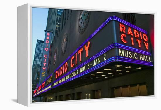 Neon lights of Radio City Music Hall at Rockefeller Center, New York City, New York-null-Framed Premier Image Canvas