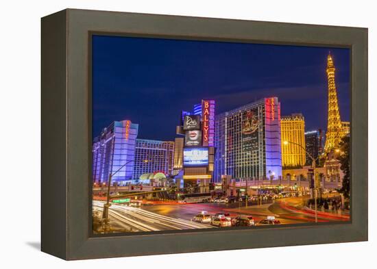 Neon Lights on Las Vegas Strip at Dusk with Car Headlights Leaving Streaks of Light-Eleanor Scriven-Framed Premier Image Canvas