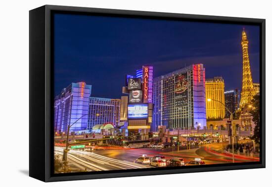 Neon Lights on Las Vegas Strip at Dusk with Car Headlights Leaving Streaks of Light-Eleanor Scriven-Framed Premier Image Canvas