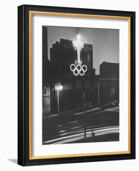 Neon Olympic Symbol in Melbourne-John Dominis-Framed Photographic Print