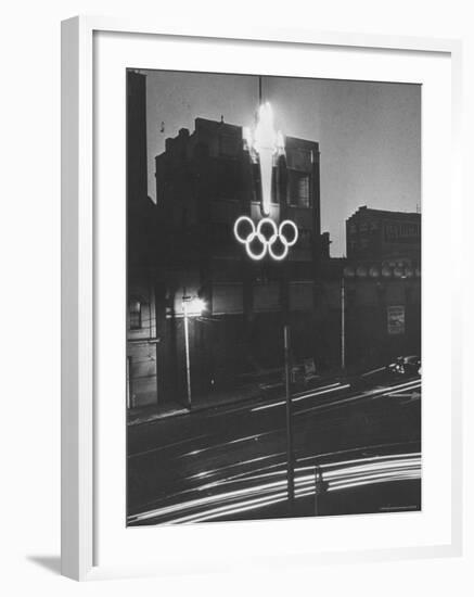 Neon Olympic Symbol in Melbourne-John Dominis-Framed Photographic Print