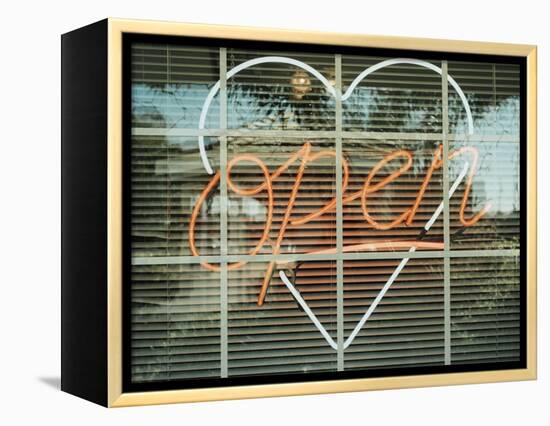 Neon 'Open' sign framed in a heart-shape in a window-null-Framed Premier Image Canvas