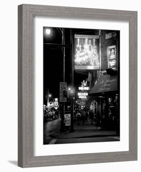 Neon sign lit up at night in a city, Rum Boogie Cafe, Beale Street, Memphis, Shelby County, Tenn...-null-Framed Photographic Print