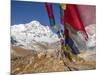 Nepal, Annapurna Conservation Area, Annapurna Base Camp, Annapurna South with prayer flags.-Merrill Images-Mounted Photographic Print