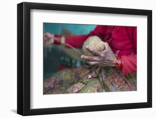 Nepal. Nepali weaving woman, posing and weaving threads for carpets. Nayapati, Eastern Kathmandu.-Bill Bachmann-Framed Photographic Print