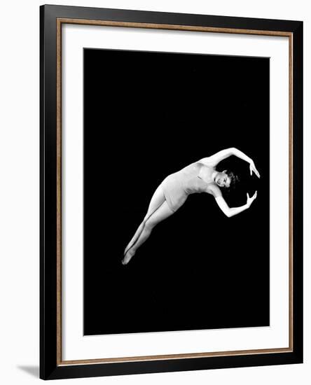 Neptune's Daughter, Esther Williams In A Swimming Pose From One Of Her Water Ballets, 1949-null-Framed Photo