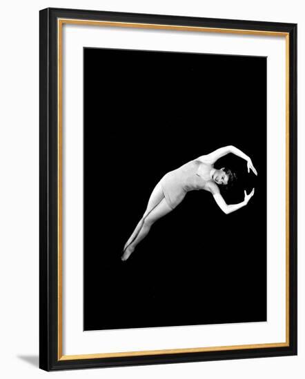 Neptune's Daughter, Esther Williams In A Swimming Pose From One Of Her Water Ballets, 1949-null-Framed Photo