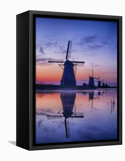 Netherlands, Kinderdijk, Sunrise along the canal with Windmills-Terry Eggers-Framed Premier Image Canvas