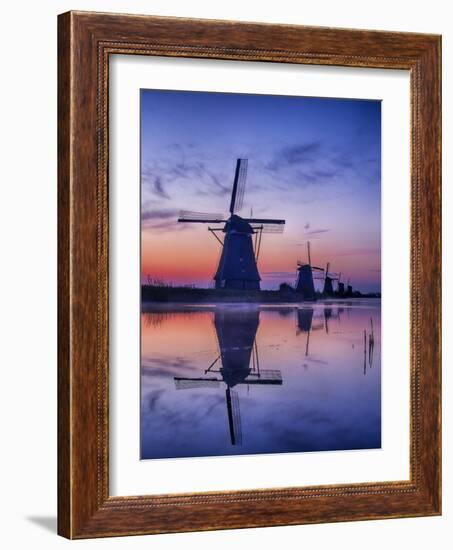 Netherlands, Kinderdijk, Sunrise along the canal with Windmills-Terry Eggers-Framed Photographic Print
