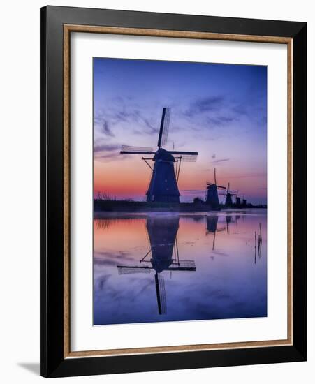 Netherlands, Kinderdijk, Sunrise along the canal with Windmills-Terry Eggers-Framed Photographic Print