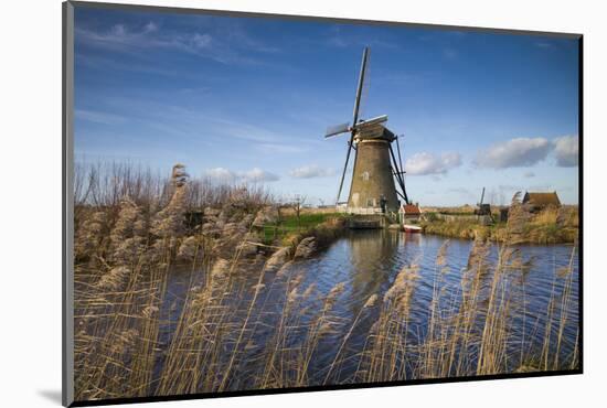 Netherlands, Kinderdijk. Traditional Dutch windmills-Walter Bibikow-Mounted Photographic Print