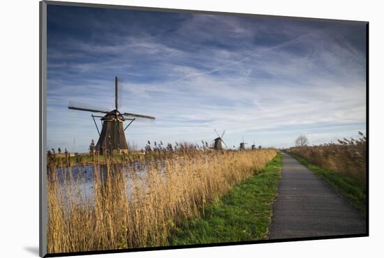 Netherlands, Kinderdijk. Traditional Dutch windmills-Walter Bibikow-Mounted Photographic Print