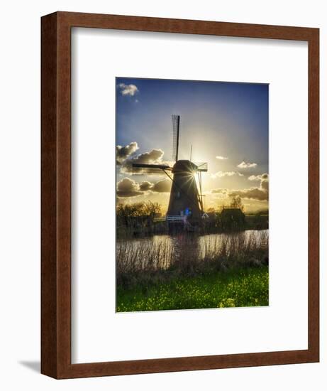 Netherlands, Kinderdijk. Windmill along the canal at sunset-Terry Eggers-Framed Photographic Print