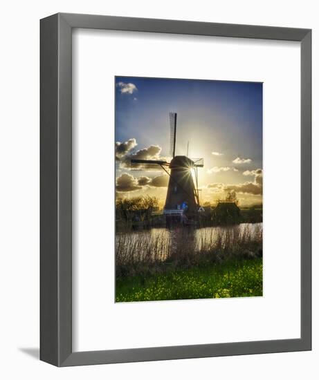 Netherlands, Kinderdijk. Windmill along the canal at sunset-Terry Eggers-Framed Photographic Print