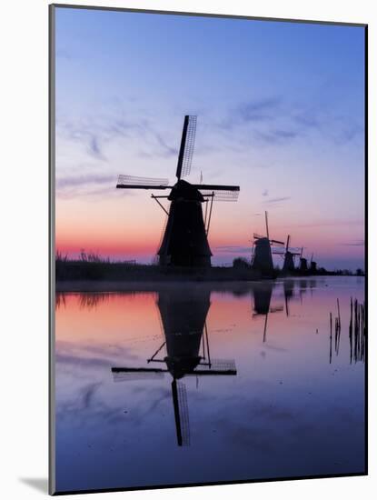 Netherlands, Kinderdijk, Windmills at Sunrise along the canals.-Terry Eggers-Mounted Photographic Print