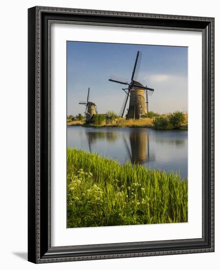 Netherlands, Kinderdijk, Windmills with evening light along the canals.-Terry Eggers-Framed Photographic Print