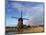 Netherlands, Nord Holland, Windmill along canal-Terry Eggers-Mounted Photographic Print