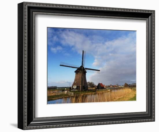 Netherlands, Nord Holland, Windmill along canal-Terry Eggers-Framed Photographic Print