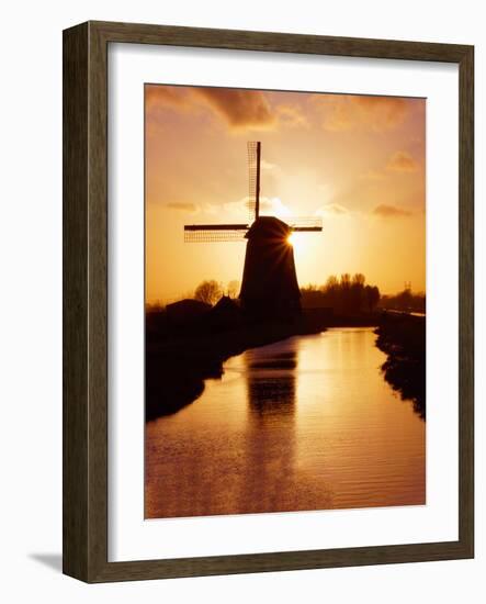 Netherlands, Nord Holland, Windmill along canal-Terry Eggers-Framed Photographic Print