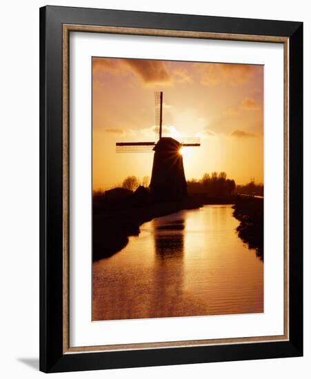 Netherlands, Nord Holland, Windmill along canal-Terry Eggers-Framed Photographic Print