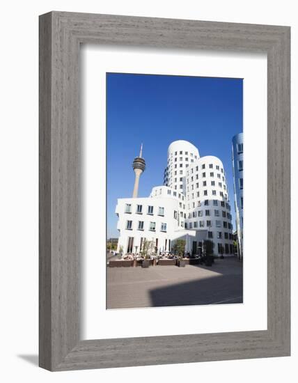 Neuer Zollhof Buildings Designed by Frank Gehry with Rheinturm Tower, Media Harbour-null-Framed Photographic Print